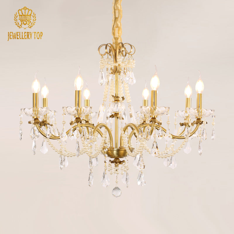 Angled perspective highlighting the symmetrical arrangement of candle-style lights and the central column.