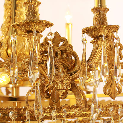 Sparkling crystal prisms and gilded arms of a magnificent vintage chandelier.