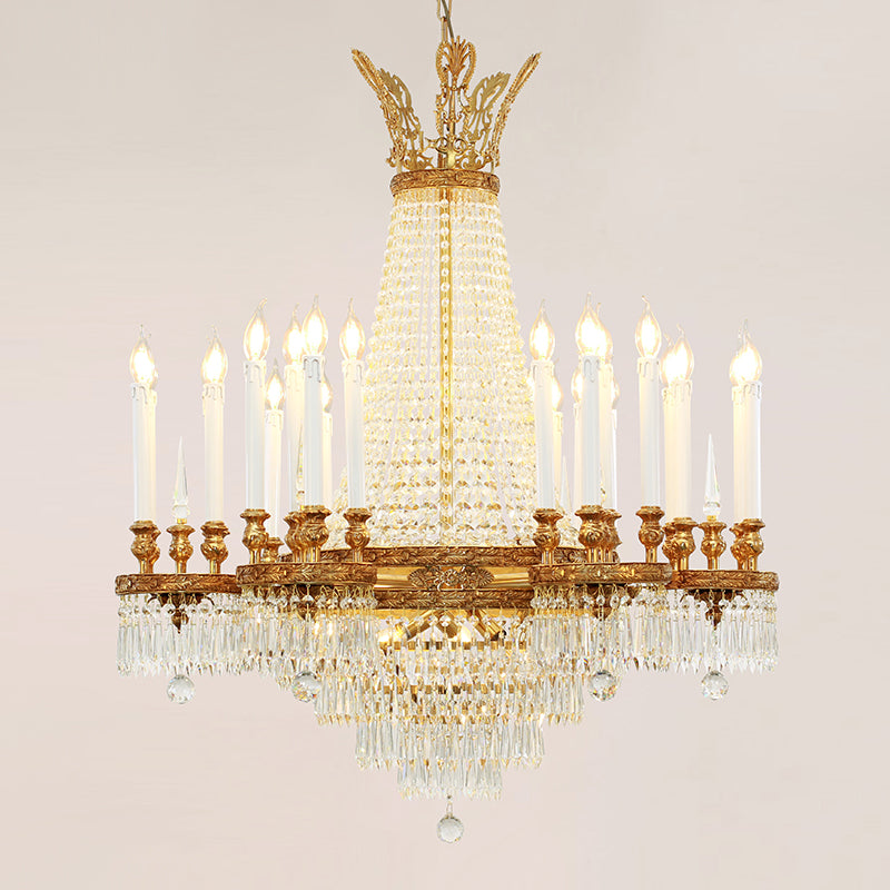 Opulent European crystal brass chandelier with a wide, cascading design on a plain background.