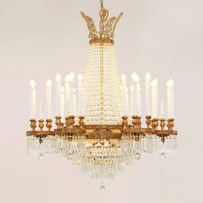 Opulent European crystal brass chandelier with a wide, cascading design on a plain background.