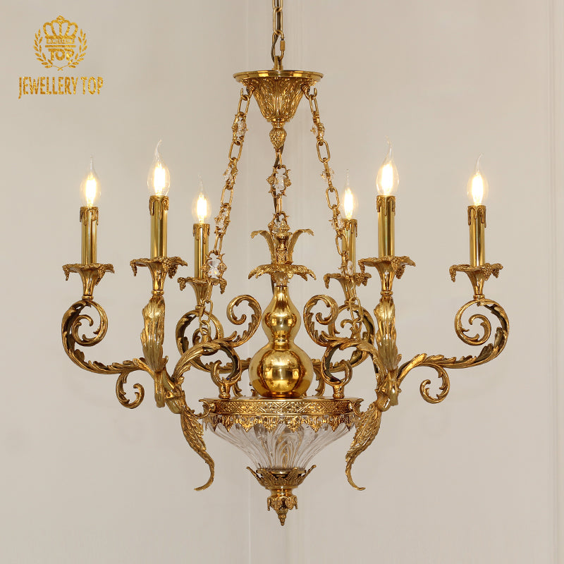 Front view of the golden antique-style brass chandelier with crystal bowl and candle arms.