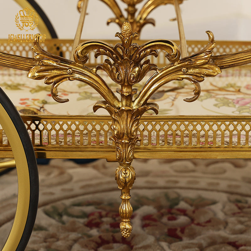 Detailed view of the lower brass railing and carved acanthus leaf corner bracket by Jewellery Top.