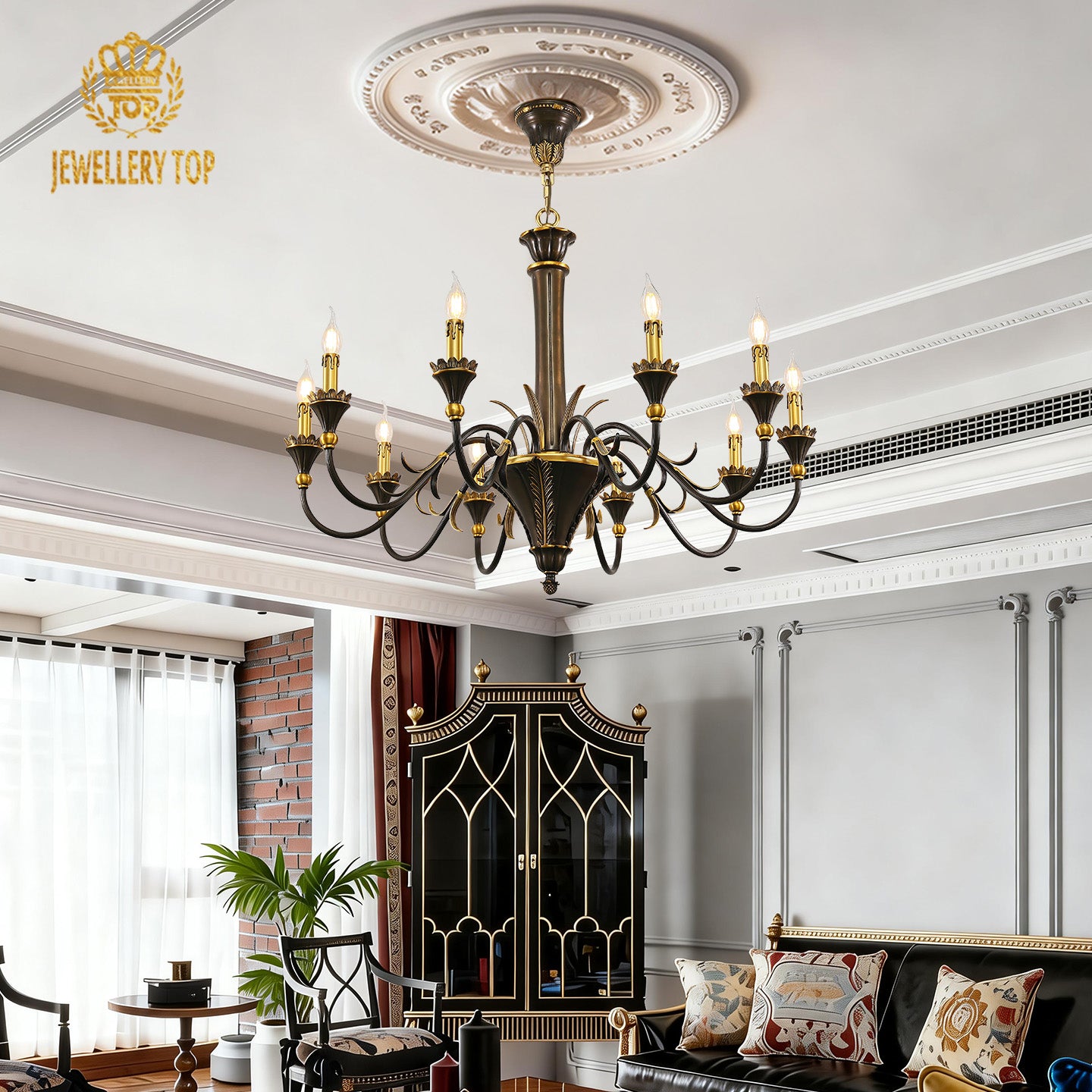 JEWELLERY TOP brass chandelier in a grey living room with a red brick wall and sofa.
