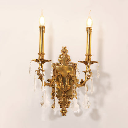 Macro detail shot focusing on the textured fabric lampshade and the intricate acanthus leaf brass arm of the wall light.