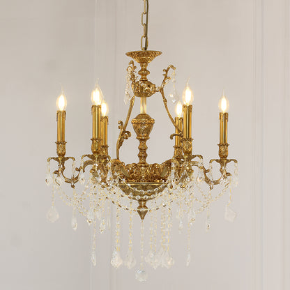 Front view of a luxury brass chandelier with candle bulbs on a white background.