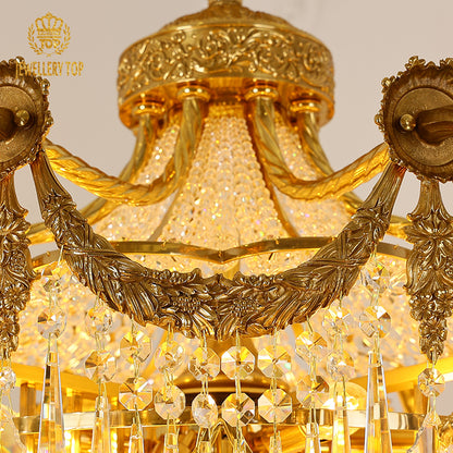 Detailed close-up of the chandelier's crystal bead curtains and ornate brass centerpiece.