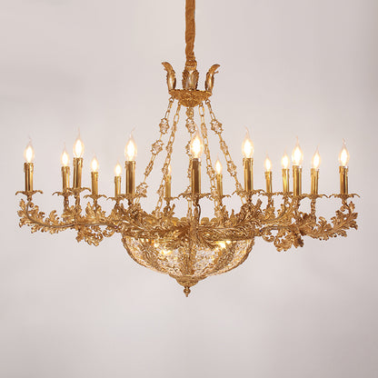 Front perspective of a decorative brass chandelier with a spherical crystal base and ornate arms.