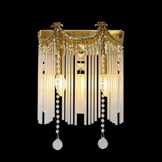 Front view of the Parisian Cascade brass wall sconce with crystal curtains and two central light columns on a dark background.