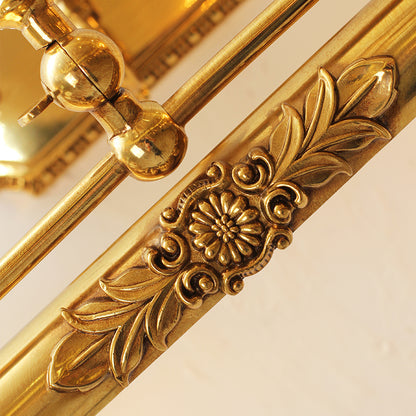 Detailed shot of the bar’s engraved floral pattern and the connecting joint, emphasizing the fine craftsmanship of the brasswork.