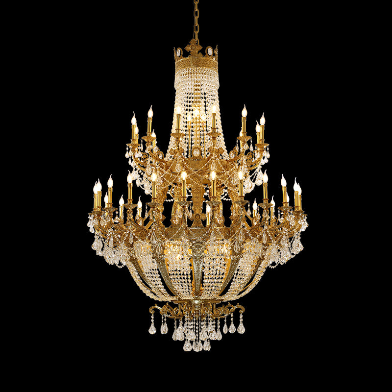 French luxury brass chandelier with crystal cascades, multi-tiered design, black background.