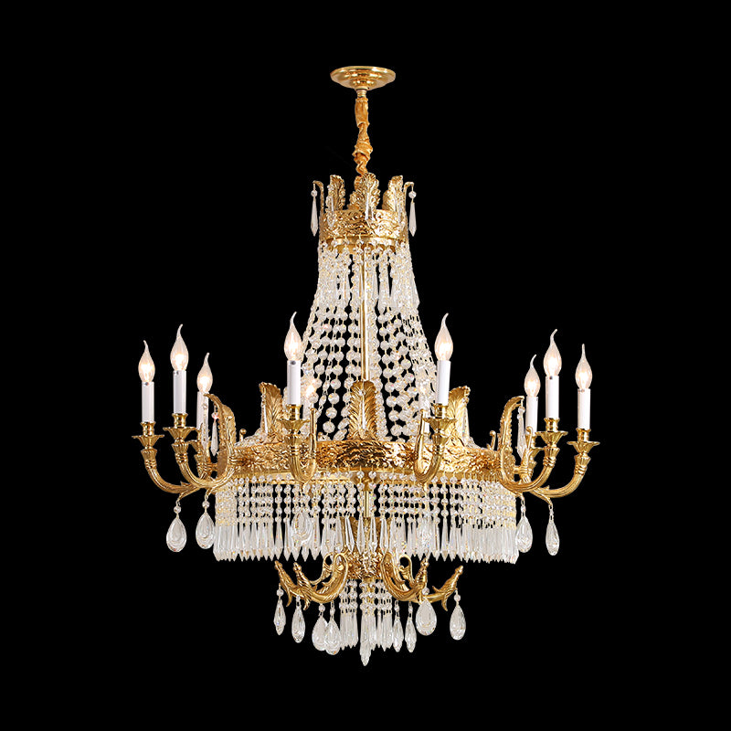 Front view of a golden antique brass chandelier with crystal cascades and candle bulbs.