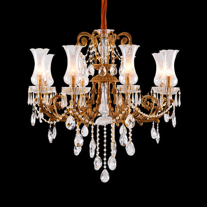 JEWELLERY TOP brand's ornate brass chandelier featuring cascading crystal pendants and frosted glass shades.