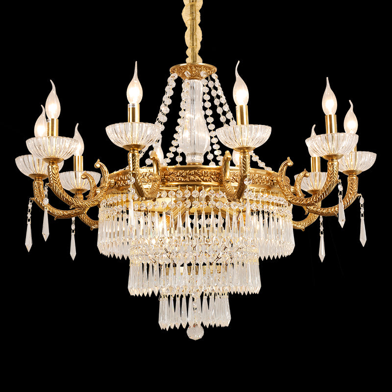 Close-up of a golden Baroque brass chandelier with crystal grids and glass cup shades.