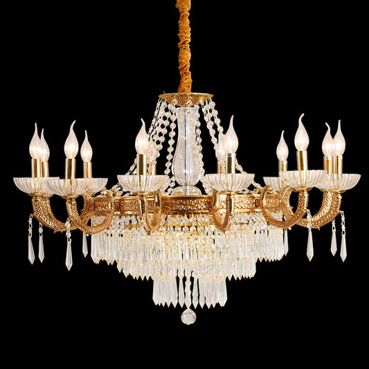Luxury French brass crystal chandelier with arched arms and candle bulbs, isolated on black.