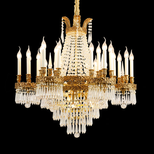 Palais Royal Couronne brass crystal chandelier with layered tiers, isolated on black background.