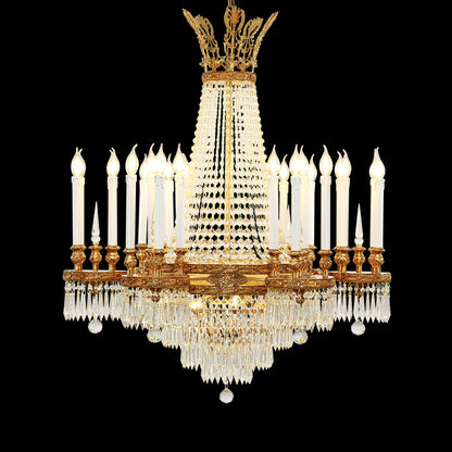A multi-tiered luxury brass chandelier with crystal curtains and candle bulbs, front view.