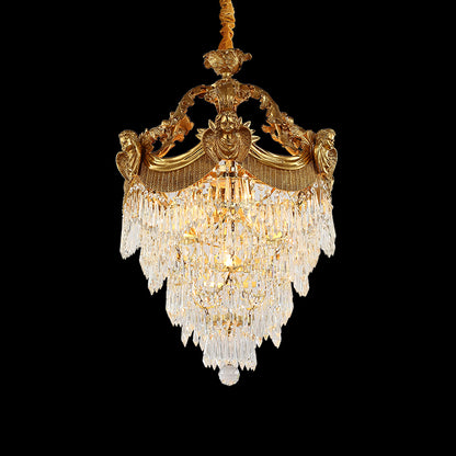 Full studio shot of the French Louis XVI cherub motif K9 crystal brass chandelier glowing against a stark black background.