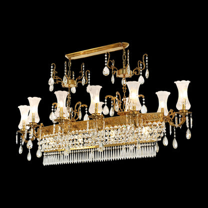 A golden classical brass chandelier with crystal drops and glass shades, isolated on black.