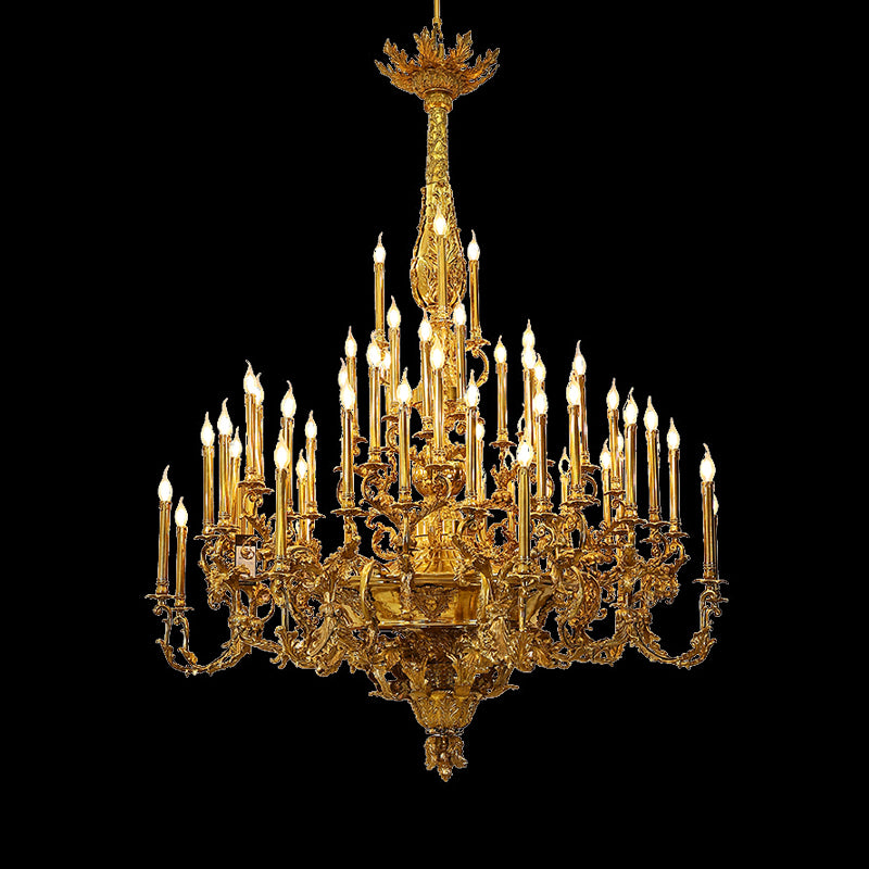 Grand Napoleonic Empire style brass chandelier with multiple candle bulbs on black background.
