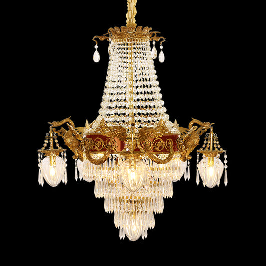Close-up detail of ornate brass animal and crystal beads on a luxury chandelier.