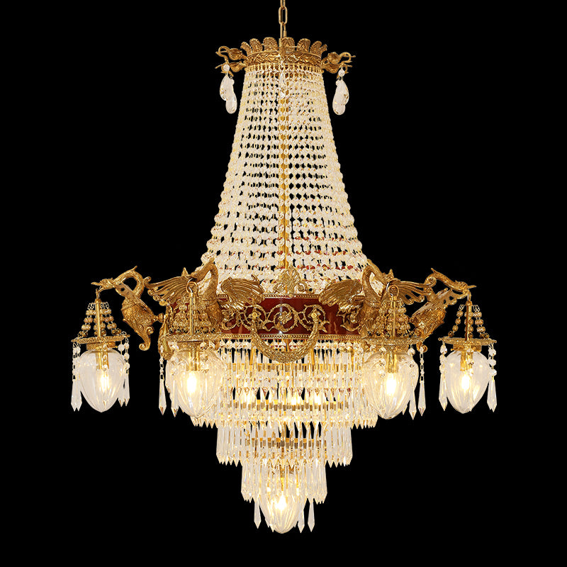 A luxury brass chandelier with white glass shades and a crimson leather, isolated.