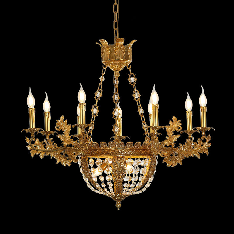 Detailed view of an eight-light retro brass chandelier with crystal beads and candle-style bulbs.