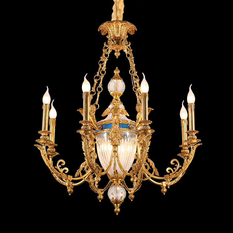 Close-up of the ornate central column featuring gilded angel sculptures and a blue enamel accent ring.