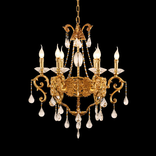 A luxury chandelier installed in a bright, airy conservatory with large windows overlooking a scenic view.