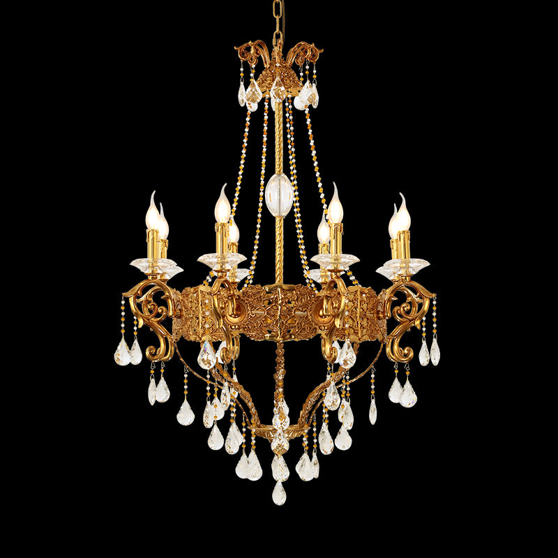 Full studio shot of the French Sun-Kissed Elegance solid brass and crystal chandelier glowing against a stark black background.