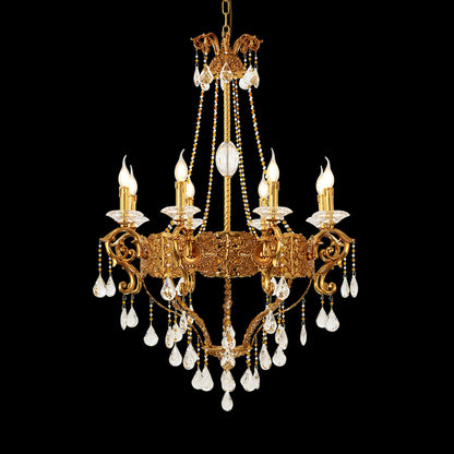 Full studio shot of the French Sun-Kissed Elegance solid brass and crystal chandelier glowing against a stark black background.
