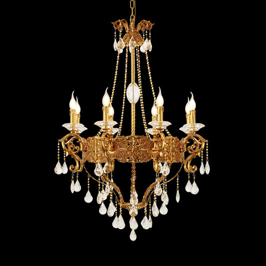 Full studio shot of the French Sun-Kissed Elegance solid brass and crystal chandelier glowing against a stark black background.