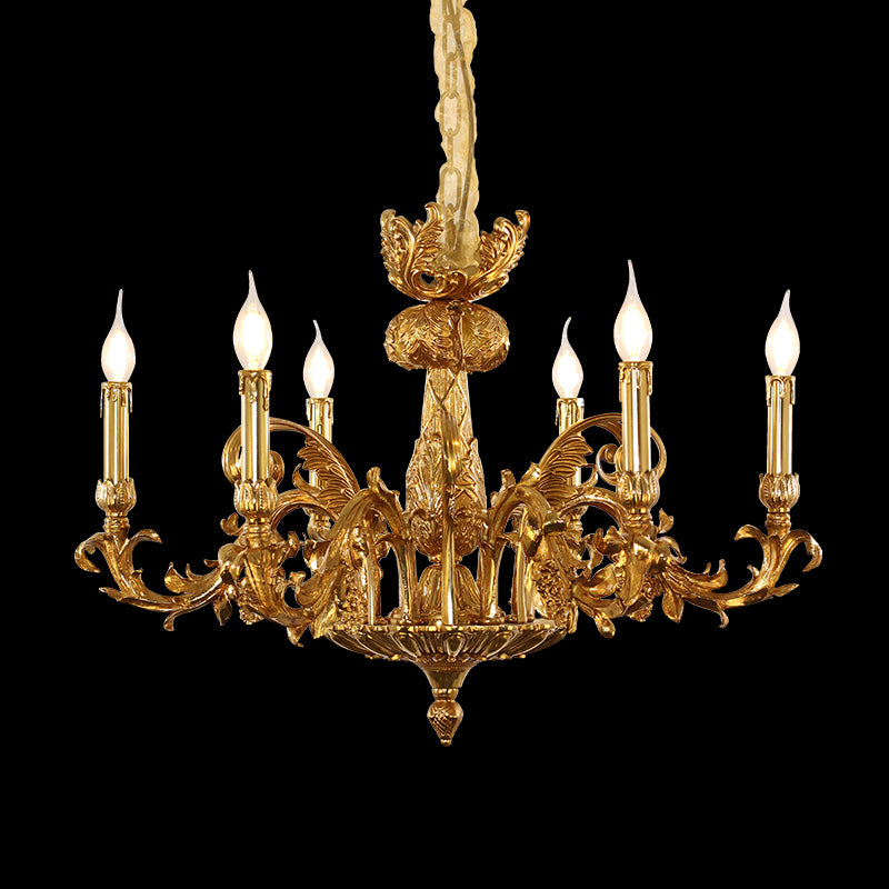 A designer chandelier elegantly suspended in a high-ceilinged room with classic French decor and crown molding.