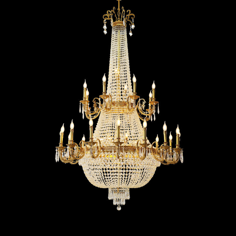 JEWELLERY TOP brand's luxury crystal chandelier featuring a towering, fully encrusted crystal column and multiple tiers of candle arms.