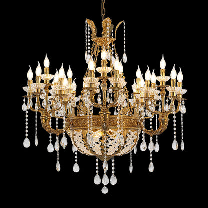 Full studio shot of the French Victorian Grandeur solid brass and crystal chandelier glowing against a stark black background.