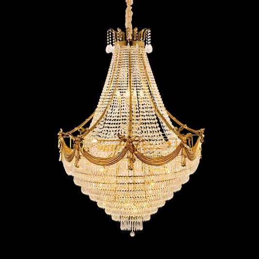 Full view of the Psyche's Waterfall french brass chandelier with cascading crystal tiers on black background.