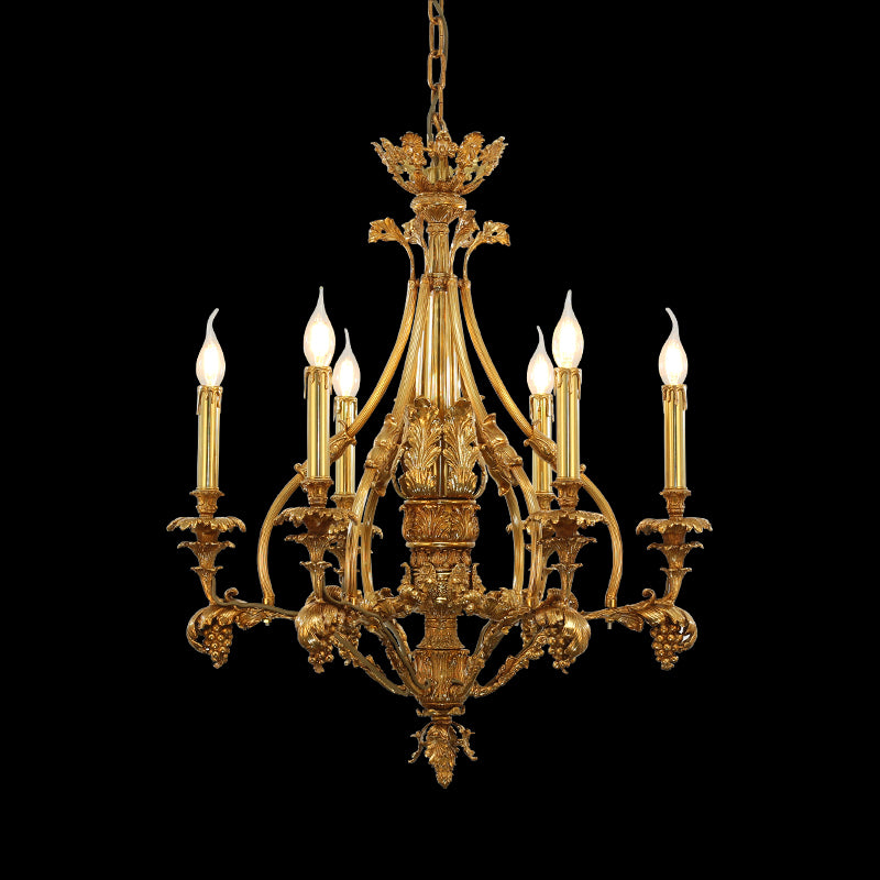 Golden French brass chandelier with six candle-style bulbs and symmetrical Baroque design.