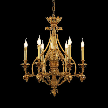 Golden French brass chandelier with six candle-style bulbs and symmetrical Baroque design.