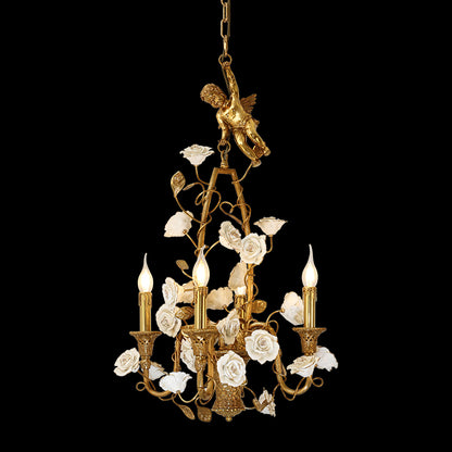 Full-length studio shot of the French Rococo Cherub & Porcelain Rose Bouquet brass chandelier glowing against a dark background.