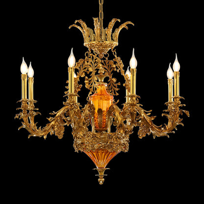 Detailed perspective of the ornate brass column, orange glass, and candle arms of the chandelier.