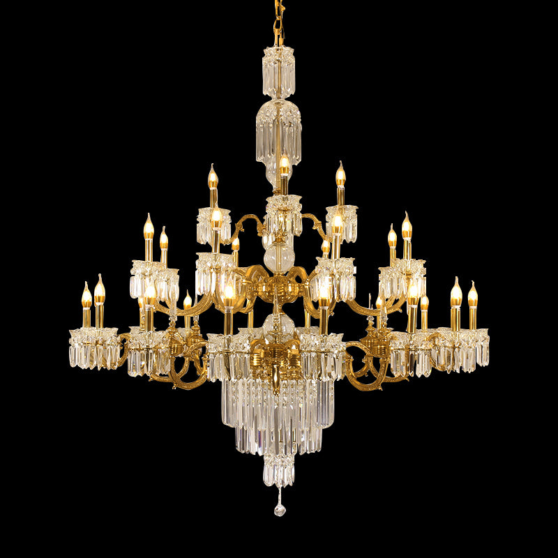 Full studio shot of the French Neoclassical Grandeur solid brass and K9 crystal chandelier glowing against a stark black background.