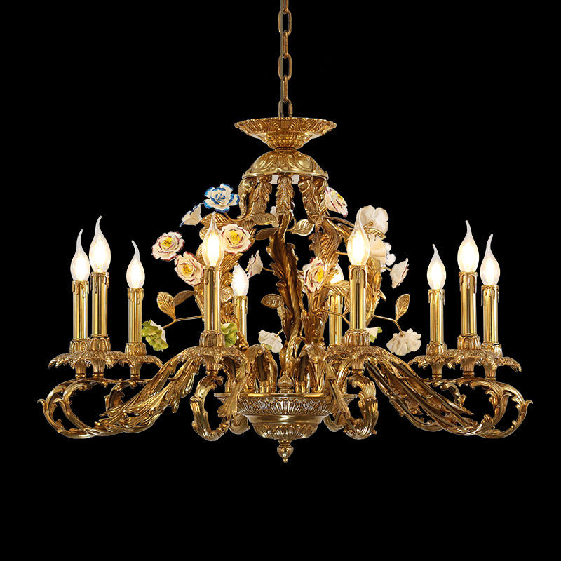 Versailles Orangerie brass chandelier with ceramic roses and blue flowers on black background.