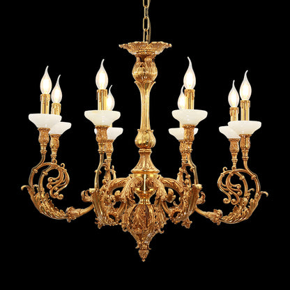 Rococo style brass chandelier with white fabric shades isolated on black background.