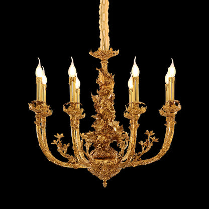 Detailed side view of the chandelier's ornate brass column, candle bulbs, and floral.