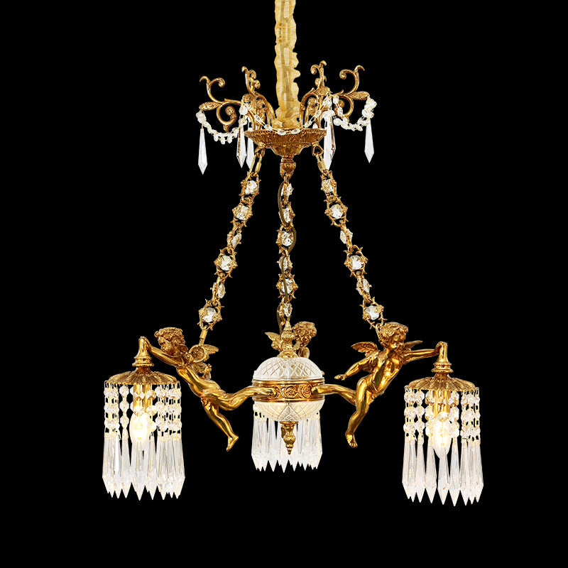 Detailed top-down view of a three-light brass chandelier with cherubs and white fabric shades.