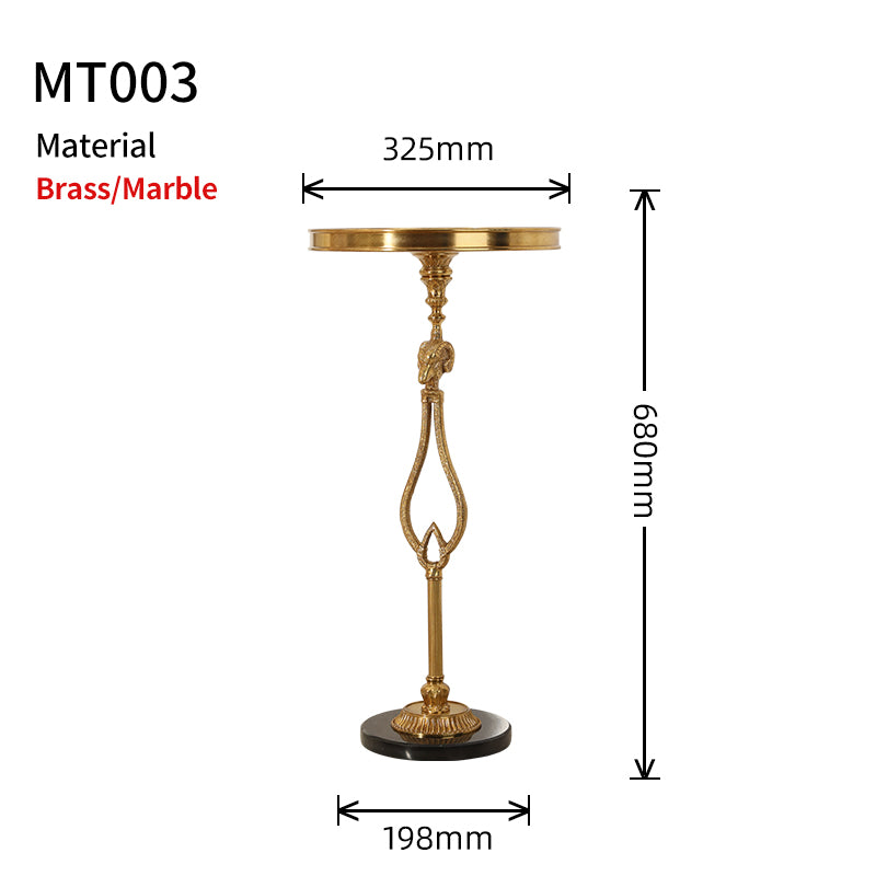 Structural dimension diagram of The Chrysomallos brass ram head table showing 325mm top, 198mm base, and 680mm height by Jewellery Top.