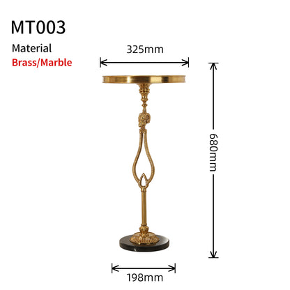 Structural dimension diagram of The Chrysomallos brass ram head table showing 325mm top, 198mm base, and 680mm height by Jewellery Top.