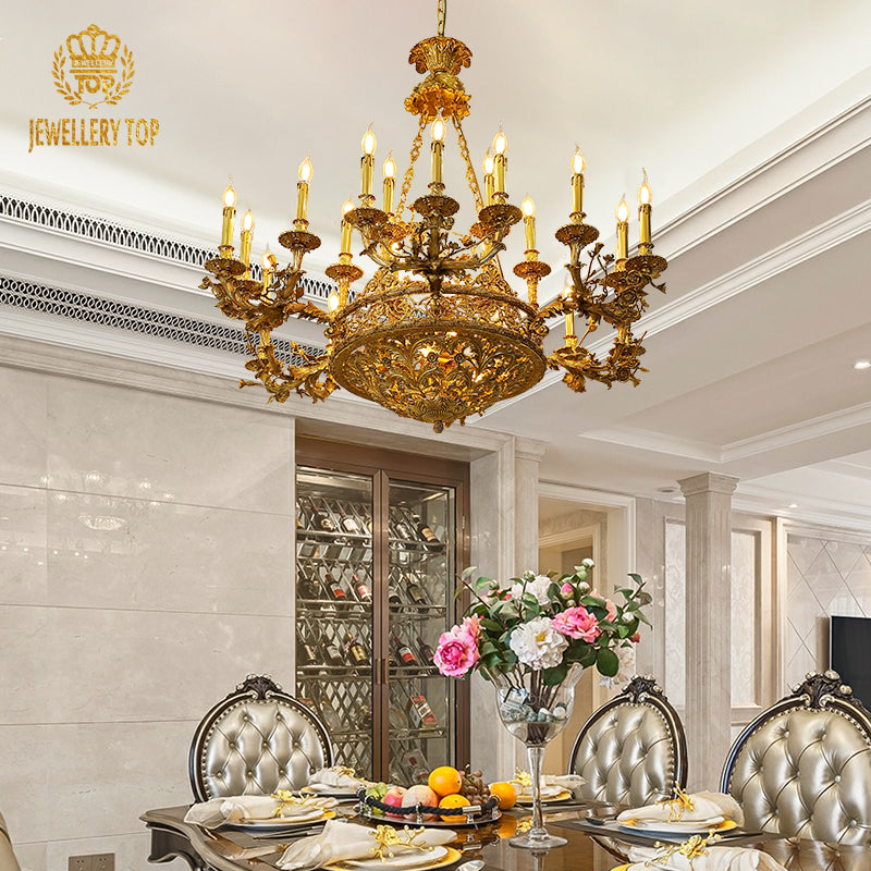 Angled perspective highlighting the symmetrical arrangement of multiple candle-style lights and the elaborate central column.