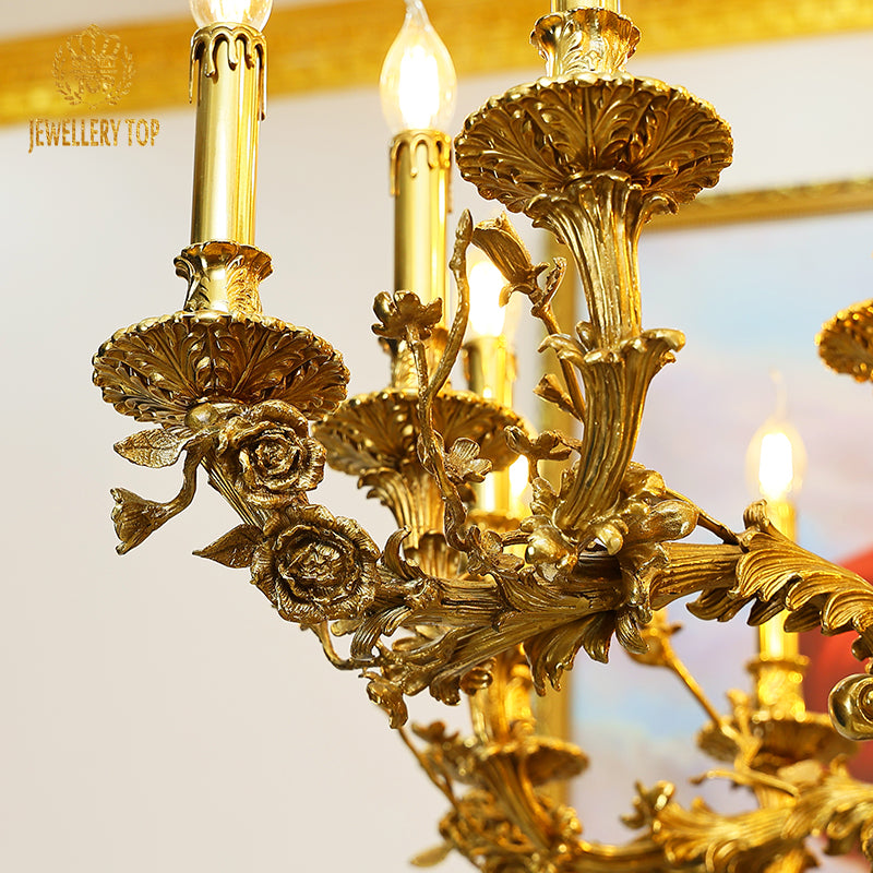 Extreme detail shot focusing on the candle-shaped filament bulbs and the decorative brass canopy at the top.