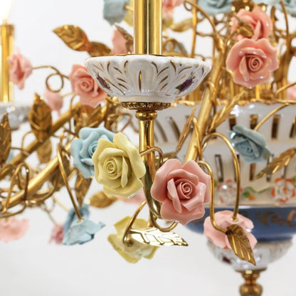 Extreme detail shot focusing on the textured candle drip details and the delicate porcelain patterns on the shades.