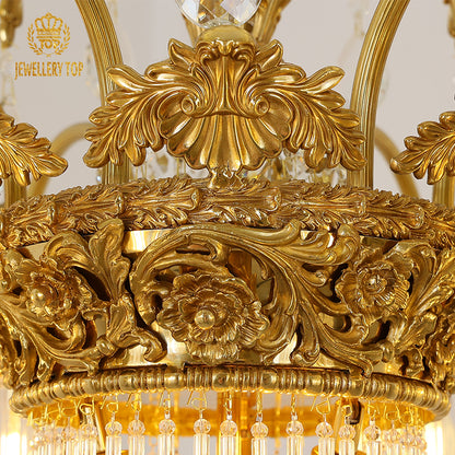 Extreme close-up of hand-chased laurel leaf and scroll details on the brass framework.